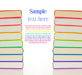 Image showing Stacks of colorful books - library concept