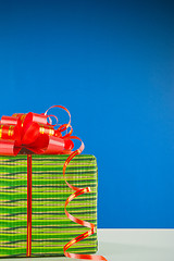 Image showing Christmas present against blue background