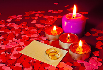 Image showing Two rings and a card with marriage proposal with four candles