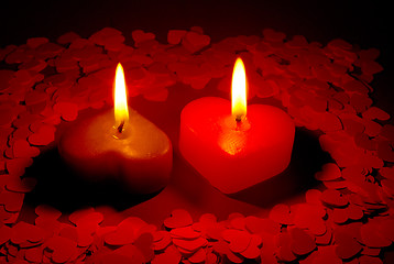 Image showing Two burning heart shaped candles