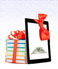 Image showing Books tied up with ribbon and tablet PC against white background