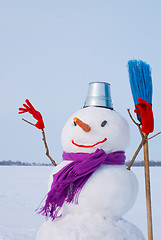 Image showing Lonely snowman at a snowy field