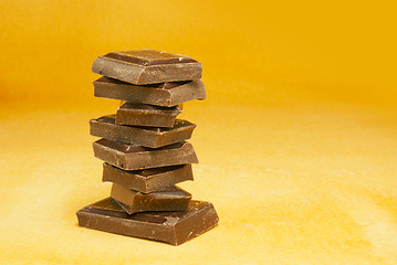 Image showing Chocolate stacked into bar