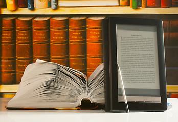 Image showing Open book and electronic book reader