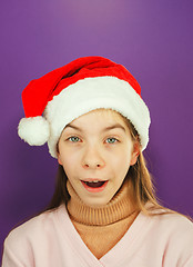 Image showing Pretty Santa girl, closeup portrait of a teen girl wearing Chris