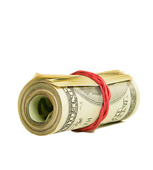 Image showing Roll of US dollars tied up with rubber