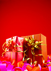 Image showing Presents in red boxes against red background