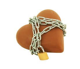 Image showing Heart shaped chocolate tied up with chains