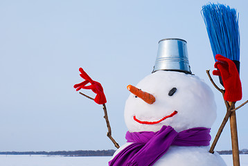 Image showing Lonely snowman at a snowy field