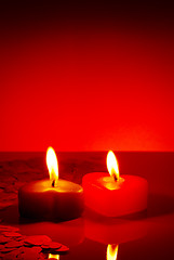 Image showing Two burning heart shaped candles