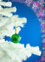 Image showing Green ball hanging on the Christmas tree