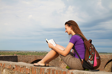 Image showing Teen girl reading the Bible