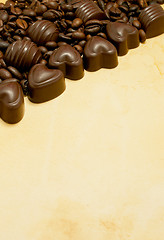 Image showing Heart shaped chocolate candies and coffee beans