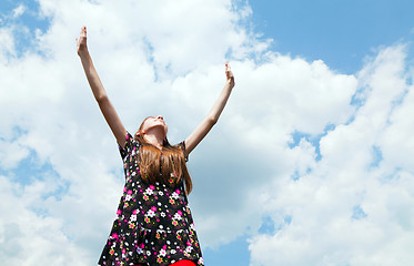 Image showing Teen girl with raised hands