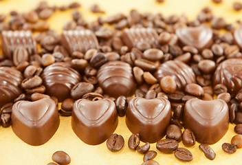 Image showing Heart shaped chocolate candies and coffee beans