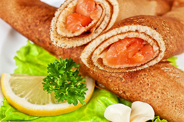 Image showing Pancakes with salmon