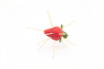 Image showing strawberry bomb. Strawberries with toothpicks
