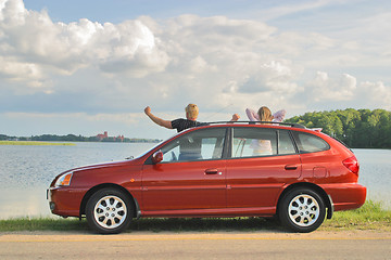 Image showing Journey to families on car