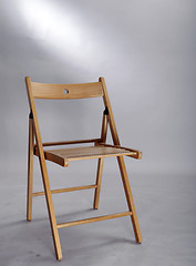 Image showing A wood foldable chair