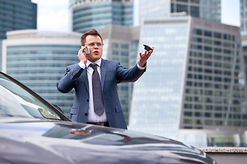 Image showing Businessman near a car