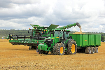 Image showing John Deere Combine Unloading Grain