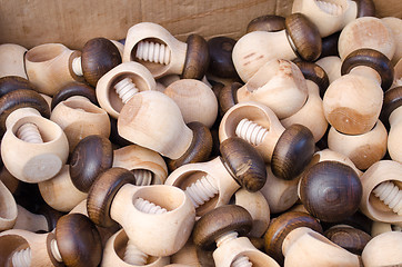 Image showing wooden handmade nut crush tools sell market fair 