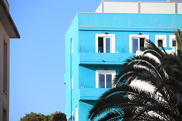 Image showing Blue apartment block