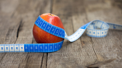 Image showing Apple and Measuring tape
