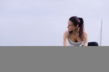 Image showing Young beautiful  woman jogging  on morning