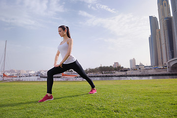 Image showing Young beautiful  woman jogging  on morning