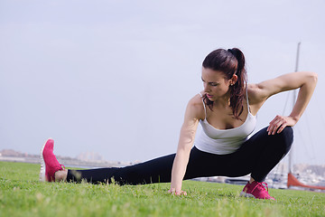 Image showing Young beautiful  woman jogging  on morning