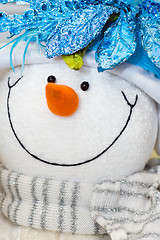 Image showing Snow man toy with glamour scarf.