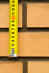 Image showing Brick and ruler