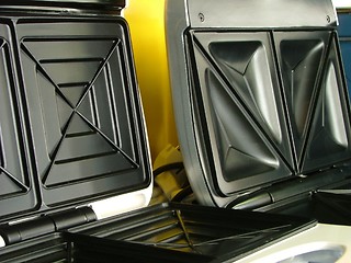 Image showing new toasters in a row