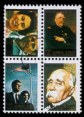 Image showing Stamp printed by Ajman shows Queen Elizabeth and Prince Philip Mountbatten, American officer, President Kennedy and Jacqueline Kennedy, Georges Clemenceau