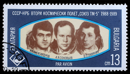 Image showing Stamp printed in Bulgaria shows Cosmonauts Anatoly Solovyev, Viktor Savinykh, Aleksandr Panayatov Aleksandrov of space ship Soyuz TM-5