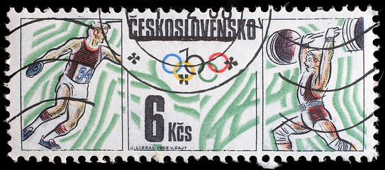 Image showing Stamp printed by Czechoslovakia, shows Olympics, table tennis and weightlifting