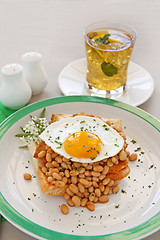 Image showing Egg On Baked Beans