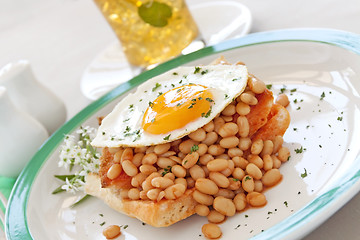 Image showing Egg On Baked Beans