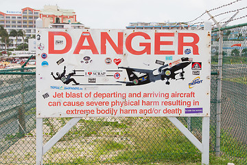 Image showing PRINCESS JULIANA AIRPORT, ST MARTIN - JULY 19, 2013: Warning sig