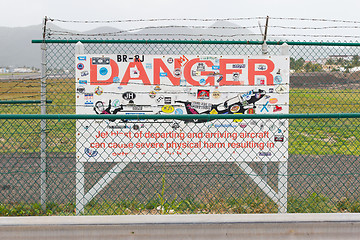 Image showing PRINCESS JULIANA AIRPORT, ST MARTIN - JULY 19, 2013: Warning sig