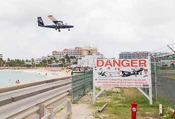 Image showing PRINCESS JULIANA AIRPORT, ST MARTIN - JULY 19, 2013: Warning sig