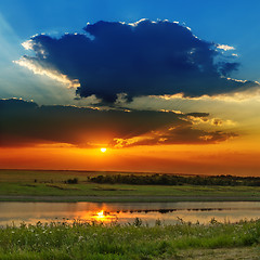 Image showing dramatic sunset over river