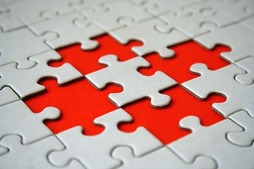 Image showing Red jigsaws