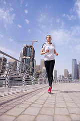 Image showing woman jogging at morning