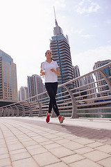 Image showing woman jogging at morning