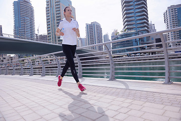 Image showing woman jogging at morning