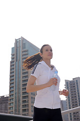 Image showing woman jogging at morning