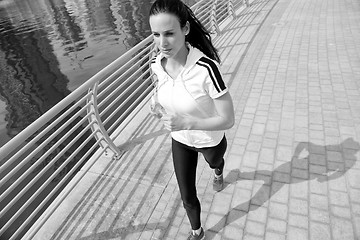 Image showing woman jogging at morning