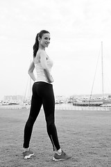 Image showing Young beautiful  woman jogging  on morning